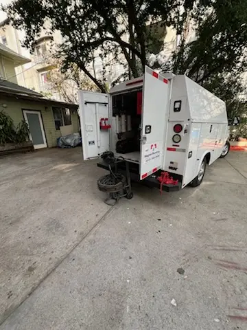 Magnet Plumbing service vehicle on-site for Grease Trap Cleaning in Catalina Villas
